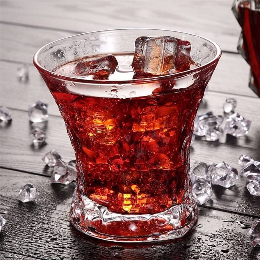 A Red Circle cocktail — a crimson vodka drink over ice in a cut-glass tumbler.
